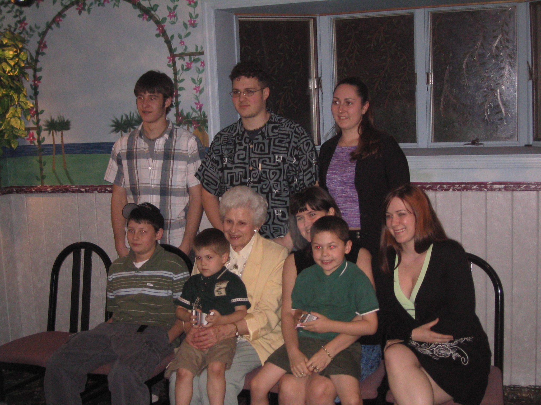 Grandma at 80 with her Grandkids (minus my brother) and her Great-Grandkids