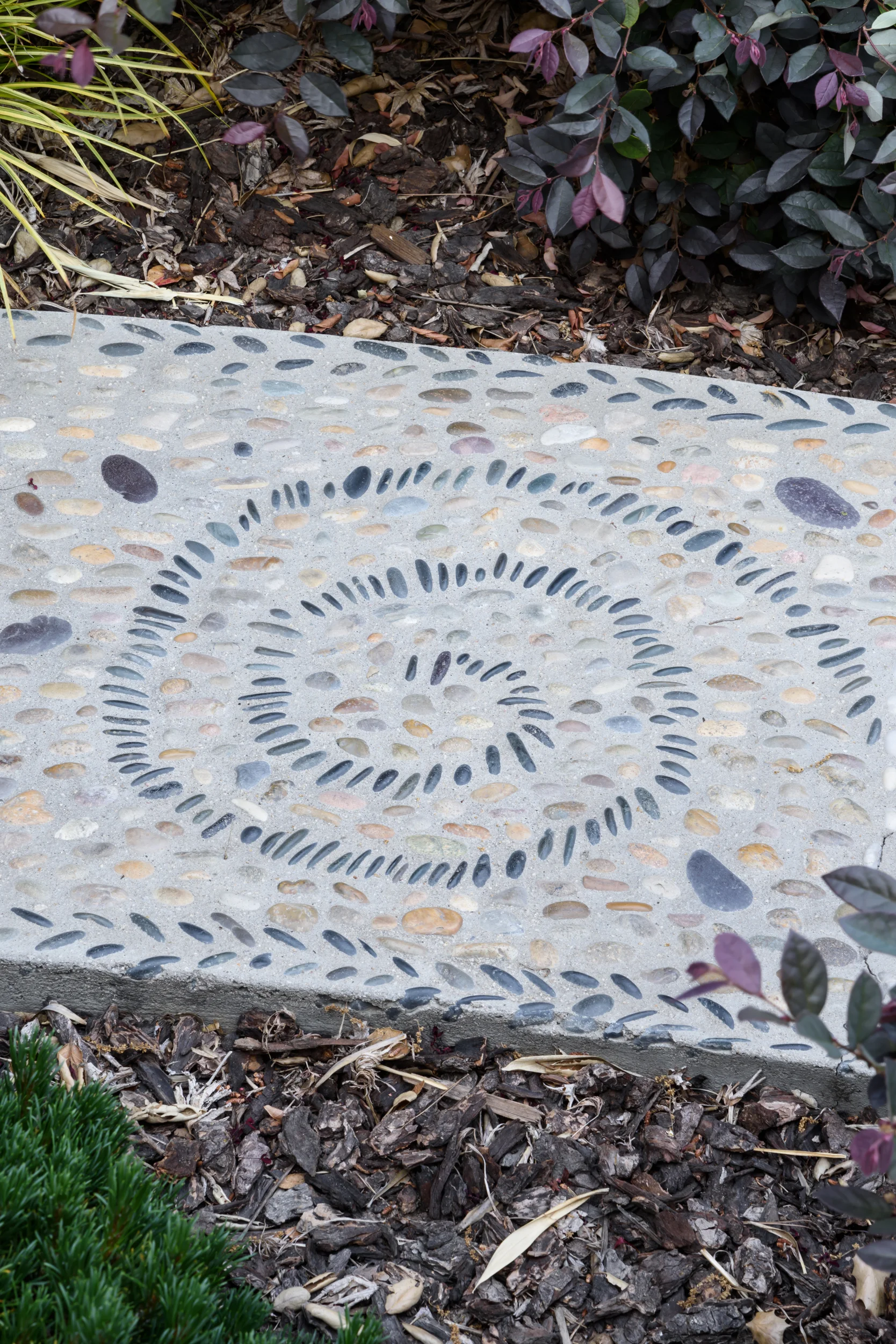 Backyard mosaic pebble pathway detail