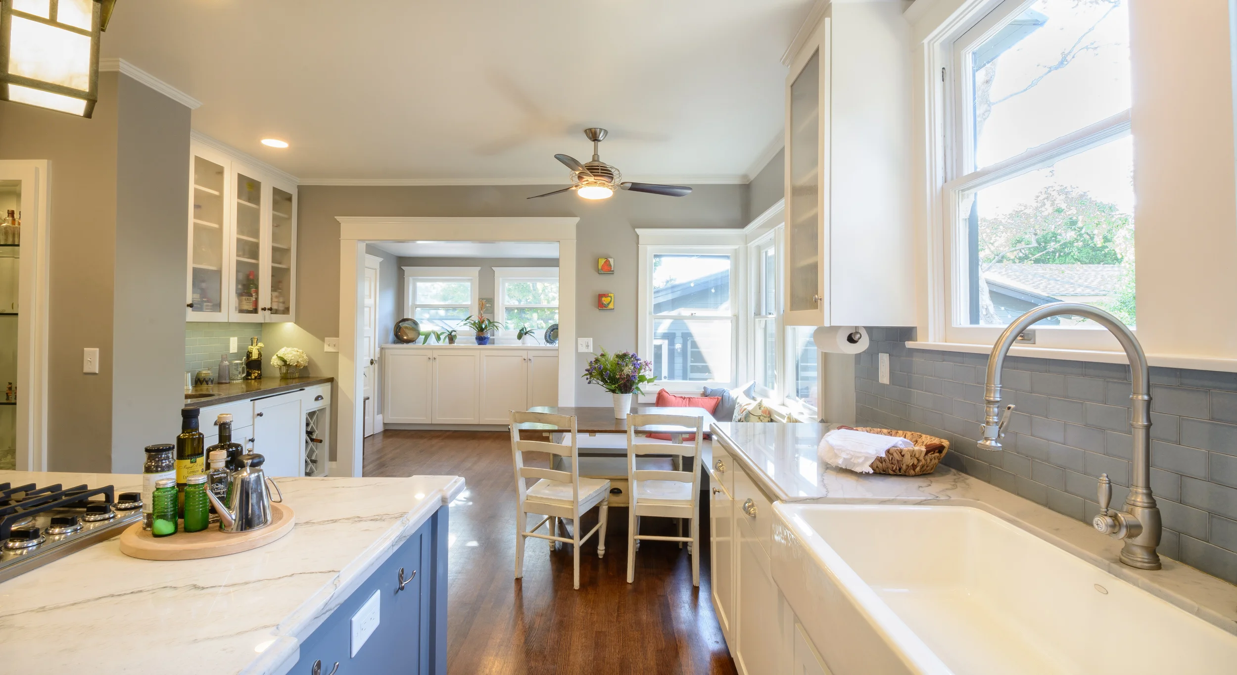 The ultimate craftsman style color palette where the soft shades of grey and blue add to the minimalism and peacefulness of the kitchen