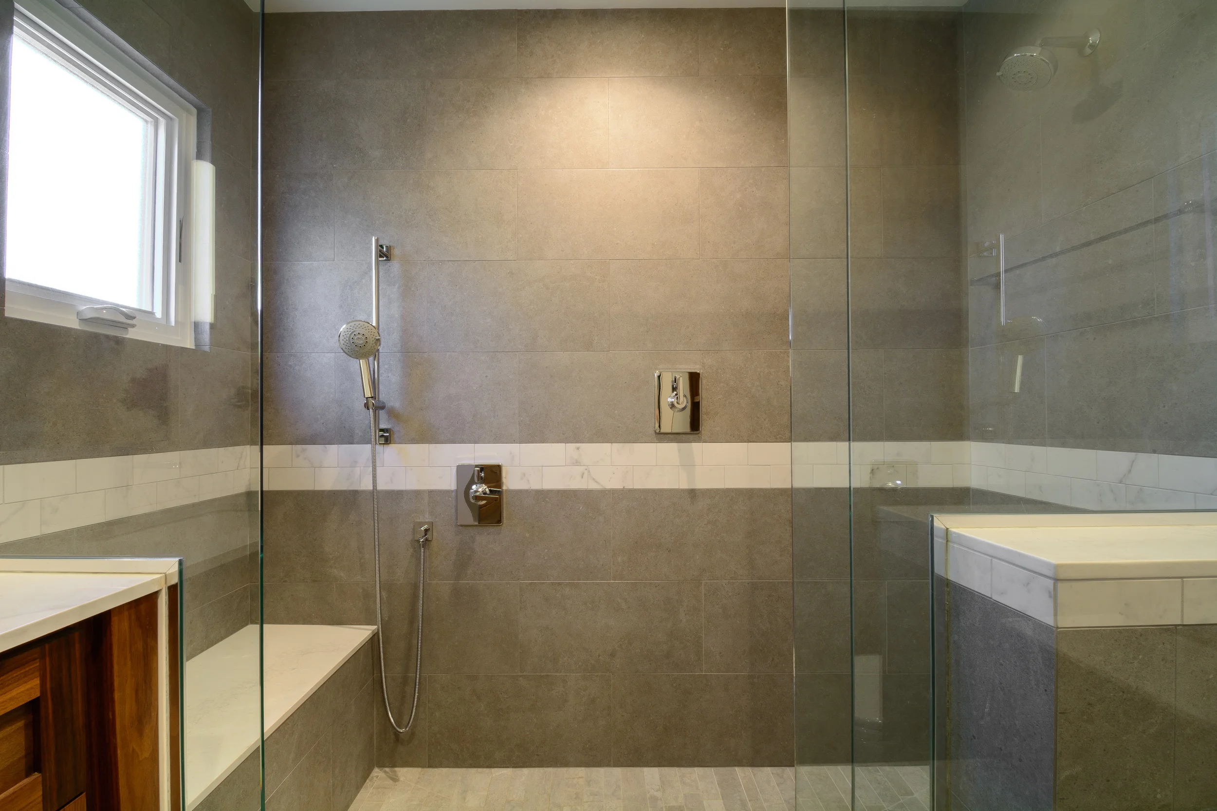 Spacious walk in shower luxurious and modern in its design