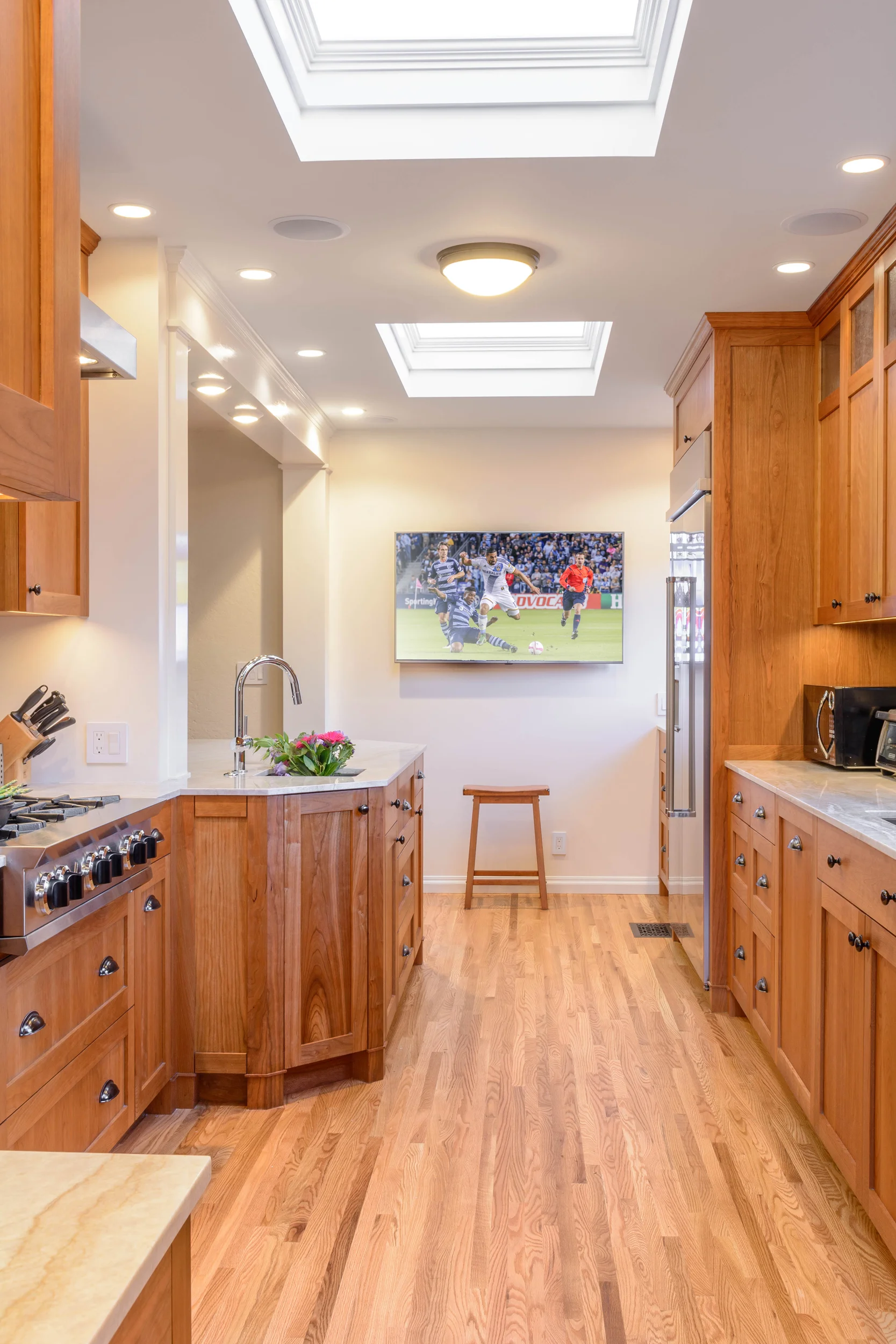 Tudor-Kitchen-Remodel-Galley-Cherry-Cabinet-Oak-Floor.jpg