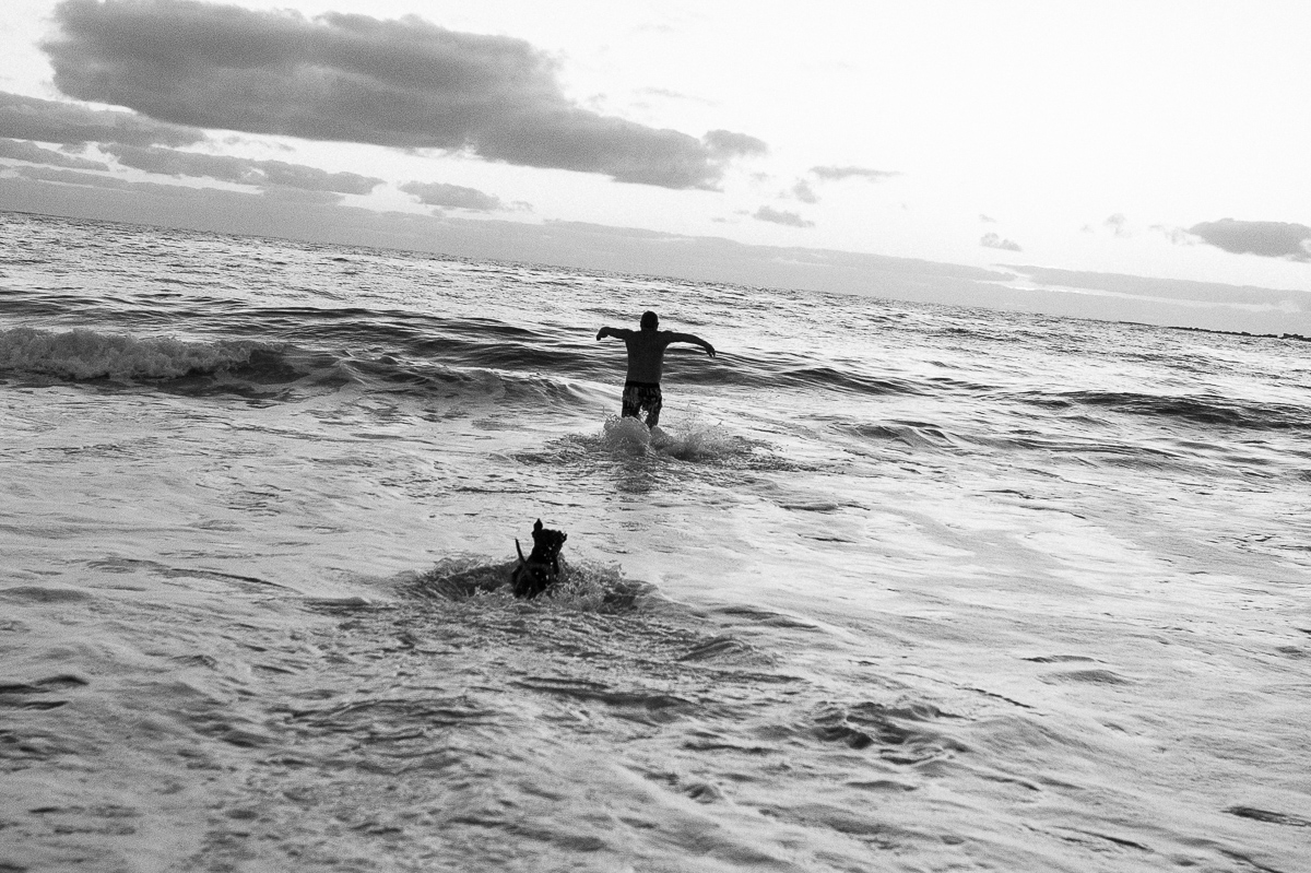  Coogee local goes for his daily swim with his Dog. 
