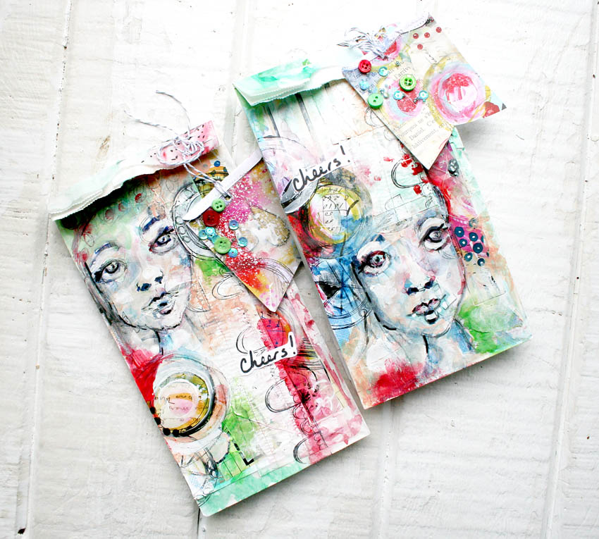  Design Team member Ashli Oliver is sharing with us some beautiful hand painted gift bags. Follow along with her video tutorial as she creates something which is sure to make you the hit of the party! She uses Art Pops™ and Paperbag Studio Stamps to 