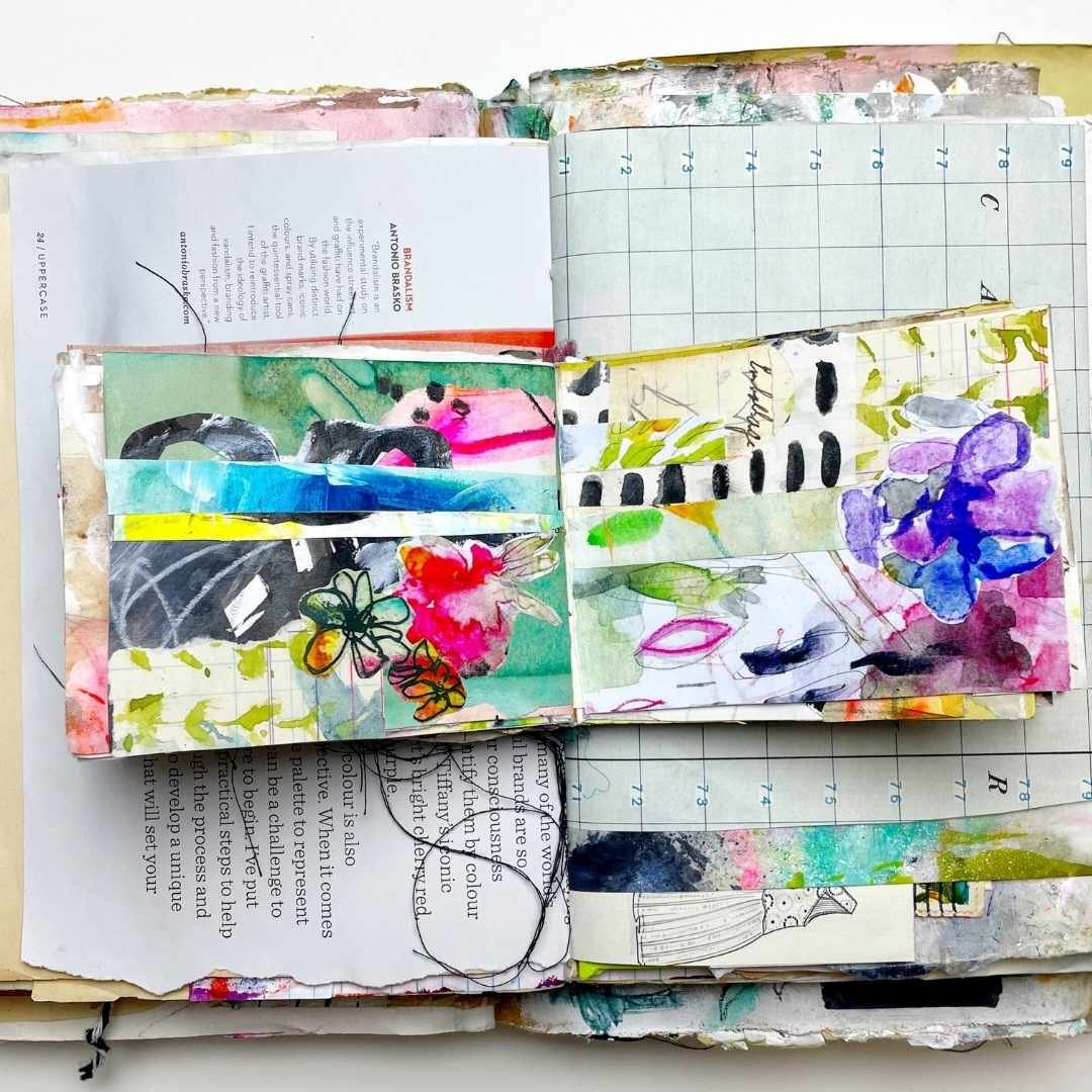 Mixed media art collage in mini journal