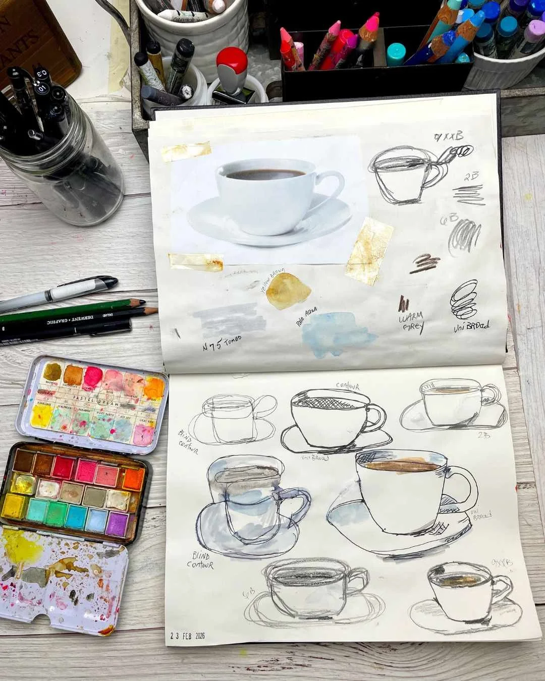 Sketching Everyday Objects: Coffee Cup Studies in a Sketchbook