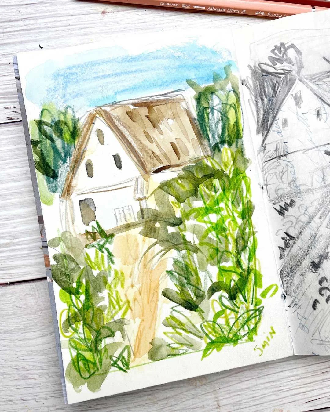 Sketchbook Spread with Cottage Scene and Pencil Study