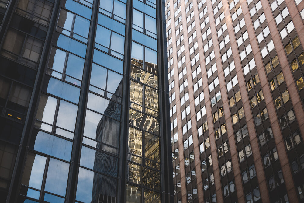 Office buildings reflect in each others windows in Manhattan's Financial District 