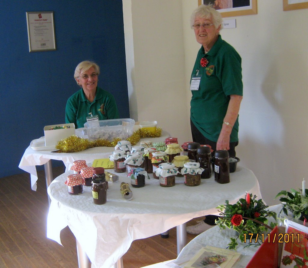 Joyce with the raffle and Muriel looking after jams pickles etc.