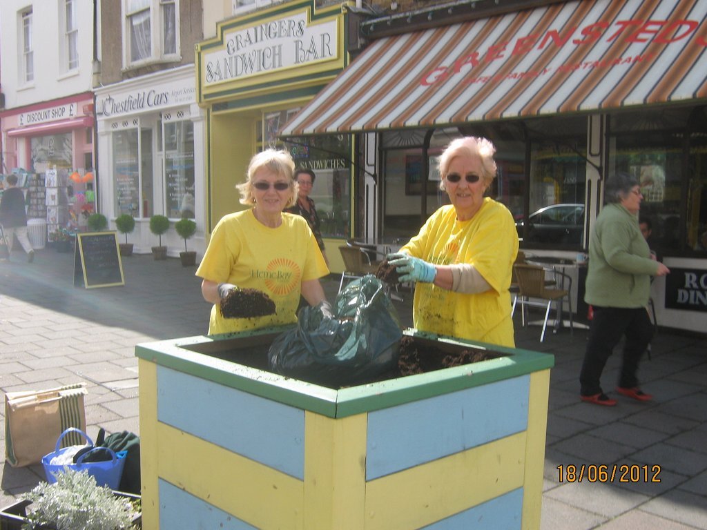 Joyce & Colleen clearing out winter plants Mortimers Street