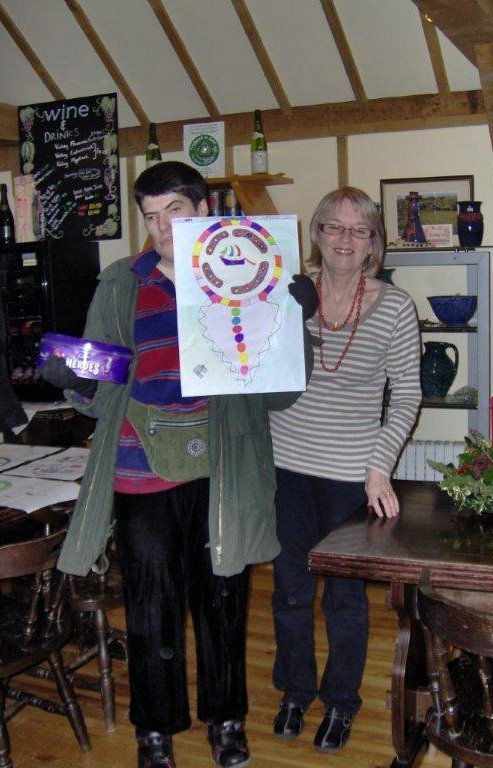 Colleen with Prize Winner from Family Investment Homes