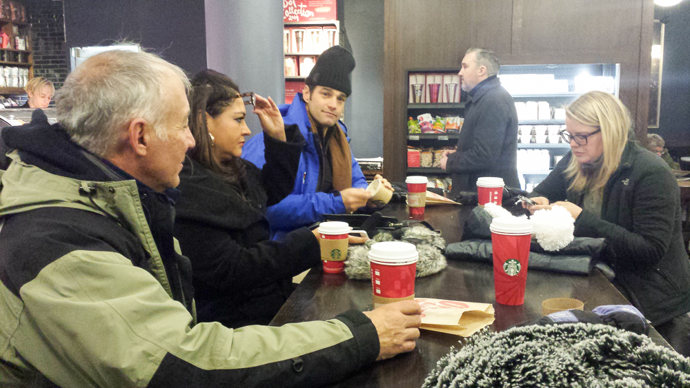 Warming up a bit between segments... (left to right: Dominic, Clarice, Rob, and Erin)