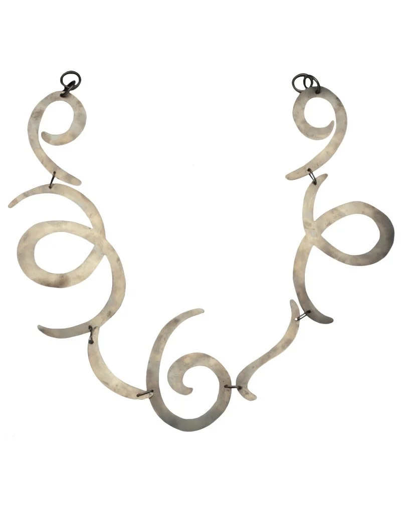 Calder Metal Holdback (design by Lori Weitzner) from Samuel & Sons