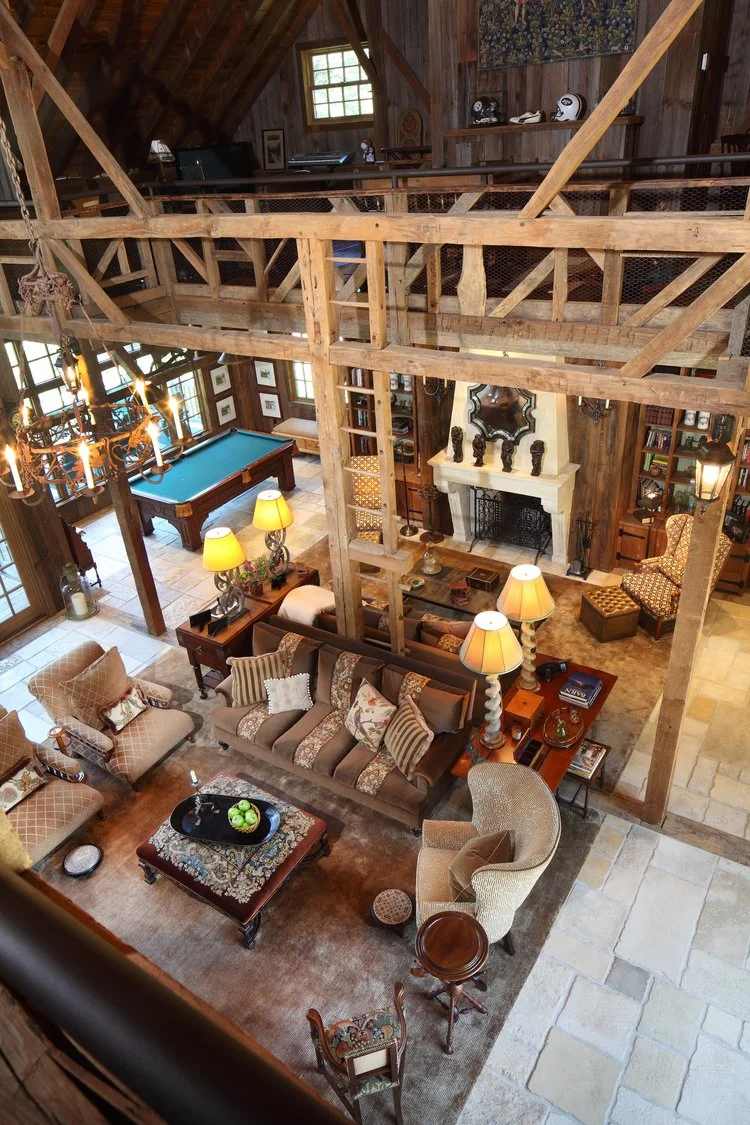 IWI_PA-Barn_living_room_pool_table_fireplace_aerial_view_from_loft_bare_wood.jpg