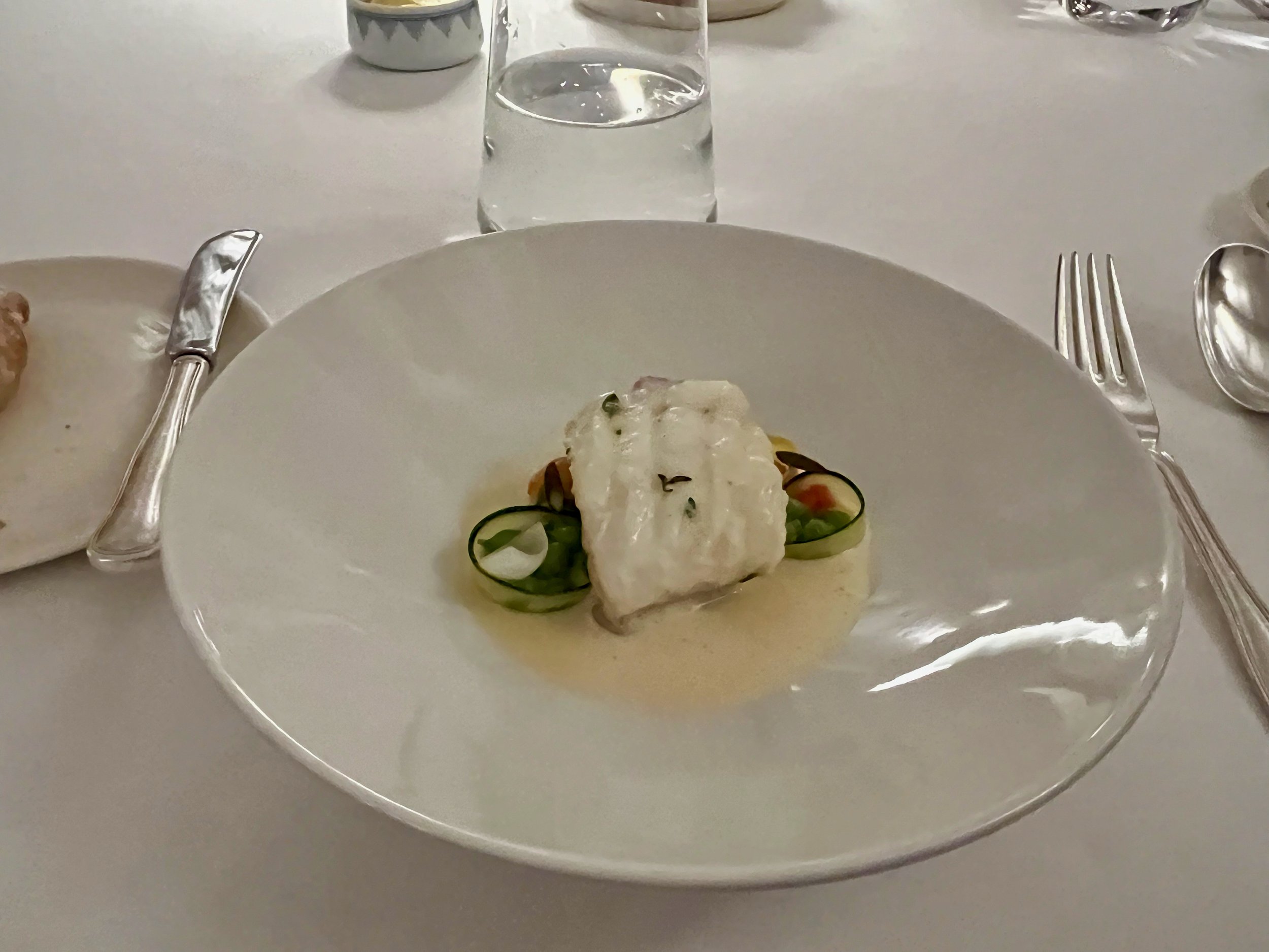 Turbot on the bone, saffron sauce, zucchini & fennel