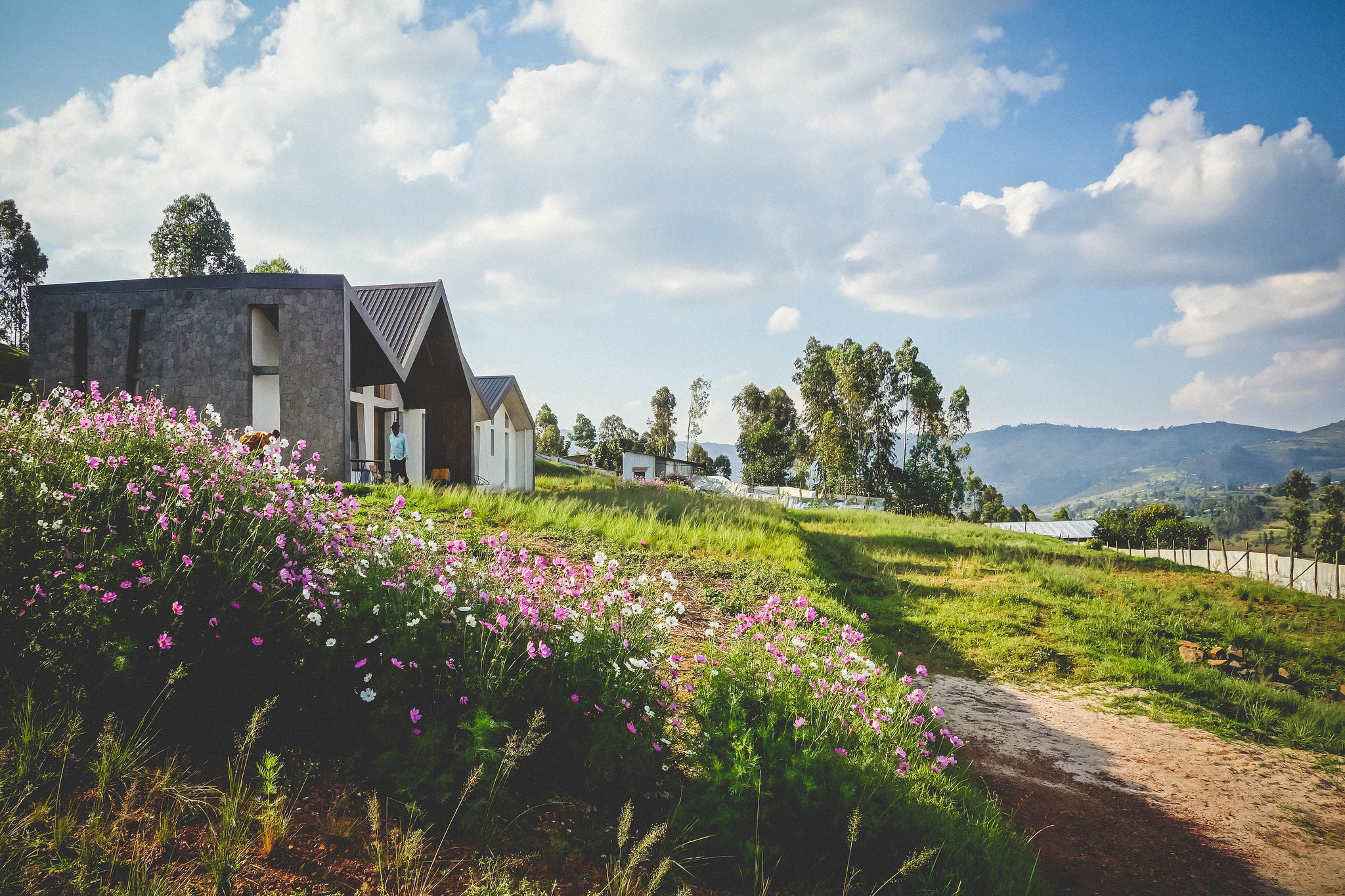 The homes now house both Rwandan and expatriate doctors, fulfilling the mission for the first phase on which has become known as Umusozi Ukiza—the Healing Hill. 