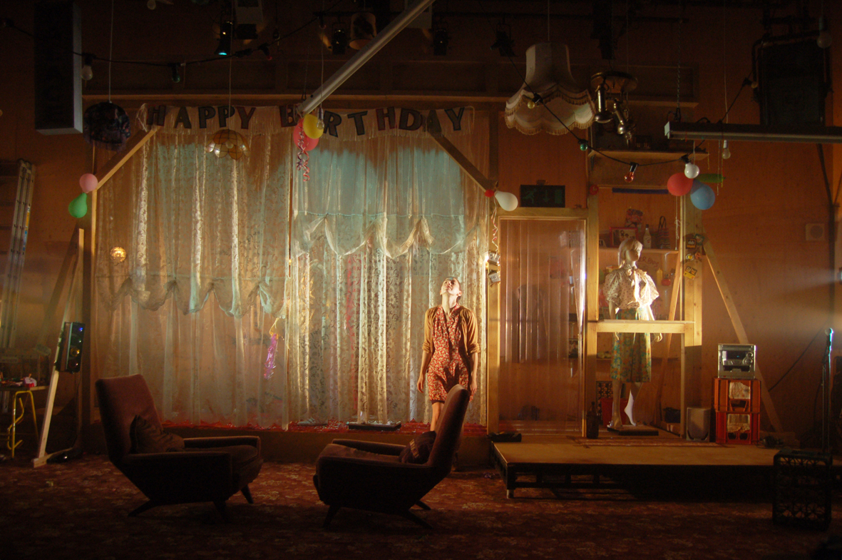 Disco Pigs / By Enda Walsh / Young Vic / September 2011 Direction: Cathal Cleary Lighting: Anna Watson Sound: Tom Gibbons PRESS Chloe Lamford's ragtag set is a triumph, a 1990s hotchpotch of detritus, old sheets and net curtains that is an exciting backdrop to Cleary's creative directorial decisions. ★★★★ THE INDEPENDENT Chloe Lamford’s design creates a chaotic fantasy world, in which the two seem half trapped in childhood, eating plastic play food and fighting shop dummies. ★★★★ THE FINANCIAL TIMES Quite rightly, Cleary treats it as the period piece it is, but he and designer Chloe Lamford also look forward to later Walsh plays with a set suggesting a stage within a stage on which Runt and Pig are condemned, like two ham actors, to act out the same script. ★★★★ THE GUARDIAN Cleary marshalls their passions well, and with the sound designer Tom Gibbons and the lighting designer Anna Watson makes something evocative of Chloe Lamford’s beautifully cluttered set. THE TIMES