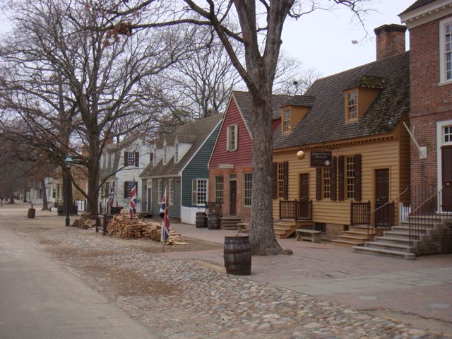 Following the AHA in Boston, I headed south, and made my way to Colonial Williamsburg , where I had a fabulous time. Since early childhood, I have always loved these kinds of places. I first visited Williamsburg when I was tiny, and it’s one of my earliest memories. I've visited plenty of other open air history sites over the years, of different scope and focus . And for all such places around the world that have developed in the last fifty years, Williamsburg is the mother ship.
I was very impressed with how knowledgeable the staff were, and keen to share their insights to colonial life. Visiting in winter meant that it was starkly beautiful, and it was possible to be the only visitor in some of the houses and stores. People explained their trades, and I as always found it fascinating. Williamsburg's archaeological discoveries, and diligent recreation of lost crafts and trades has given us a deeper knowledge of how things were done 250 years ago.
They're even willing to cop to their own errors over the years, as with this timeline showing the ways ideas about appropriate costumes have changed. Showing people how our own knowledge of history has changed like this is a great idea.
In presenting it for visitors though, it's an interesting balance, because they cannot sustain the notion that the interpreters are actually "living" the historical experience either. Of course, even the most "authentic" re-enactment is still a re -enactment: the participants are performing rather than experiencing. But if re-enactments typically focus on specific, significant events (with a known outcome), like battles, or political debates. In the tavern they straddle an awkward divide between serving Colonial Fare and beginning sentences with "In the eighteenth-century...". My swooning adoration of the National Parks Service notwithstanding, is a historical narrative more compelling for being presented by someone in kneebritches rather than a Ranger's uniform?
Does purchasing hand-dipped candles or a wax seal set really help improve people's understanding of history? (Larry Cebula just posted on people who visit Williamsburg with some historic misconceptions ). In recent years, television shows like the 1900 House (and the variants that came after it), put regular people in the role of attempting to live as things would have been in a specific historical epoch. Would it be better if places like Williamsburg offered the opportunity for visitors to actually experience such pasts rather than simply observe them?
Whatever its shortcomings - and I do know historians who sniff at these types of historical sites - I applaud anything that's engaging the public with the past. I can't deny the possibility that sites like Colonial Williamsburg were the gateway drug that led to my mainlining academic history.