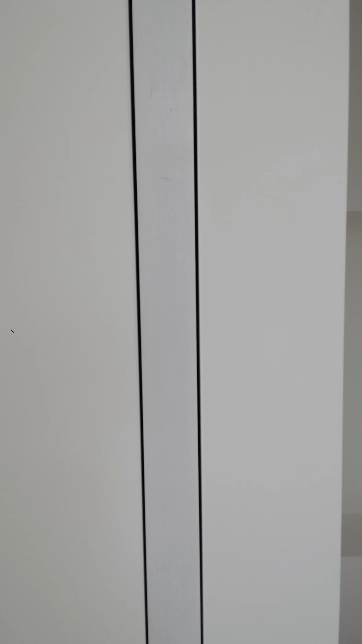Note the nice even alignment of the edges of the drywall. Seeing the finished product makes it seem all too easy. But custom pocket doors definitely take craftsmen that know what they are doing. It done right, they are beautiful and very functional.