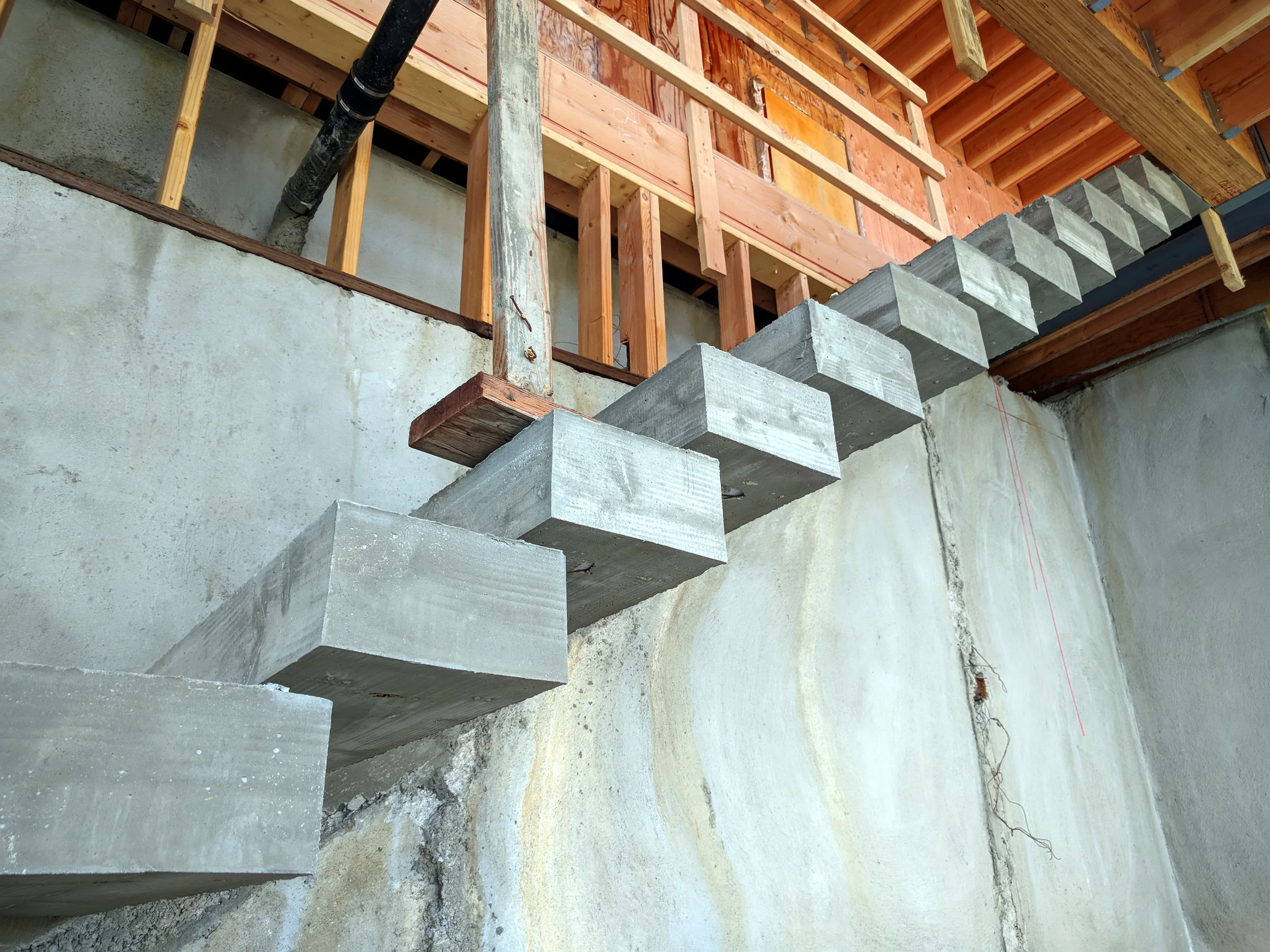 Cantilevered stairs-Between Lower Level and Main Level.