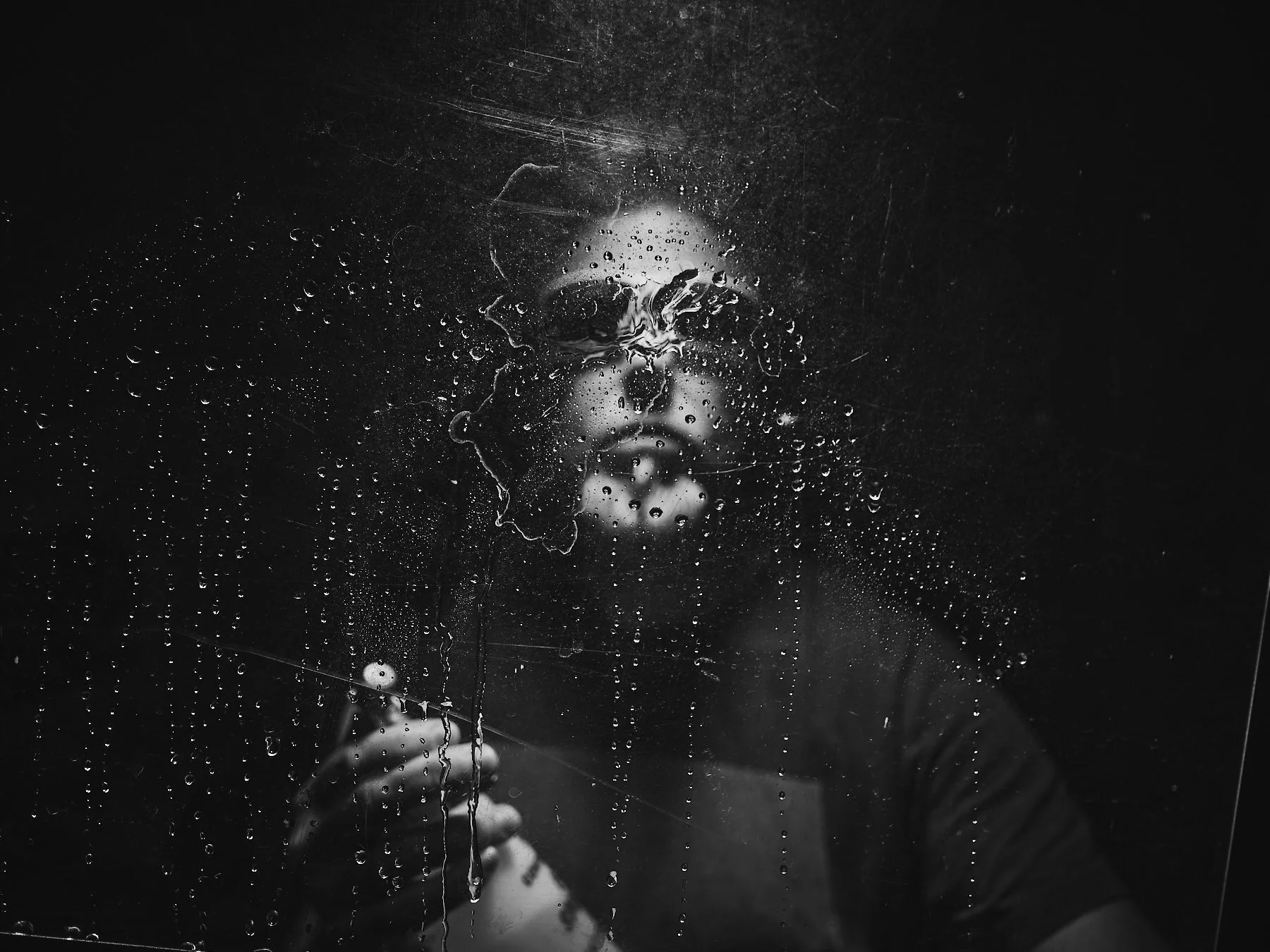 Behind the curtain: spray bottle in one hand, iPhone (with Remote app) in the other…trying to get the timing right.