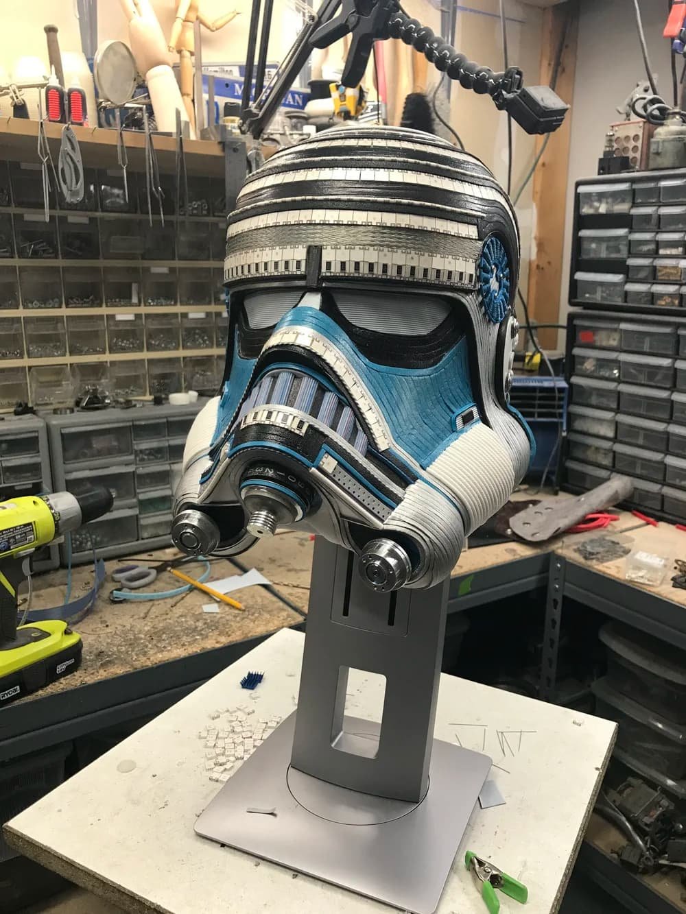 Side view of Gabriel Dishaw's McQuarrie Stormtrooper helmet, upcycled white and blue materials inspired by Ralph McQuarrie's Star Wars concept art