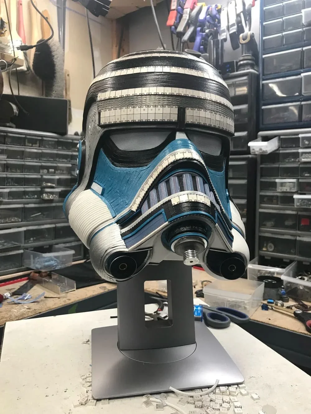 Side view of Gabriel Dishaw's upcycled McQuarrie Stormtrooper helmet sculpture, white and blue reclaimed materials inspired by Ralph McQuarrie's Star Wars concept art