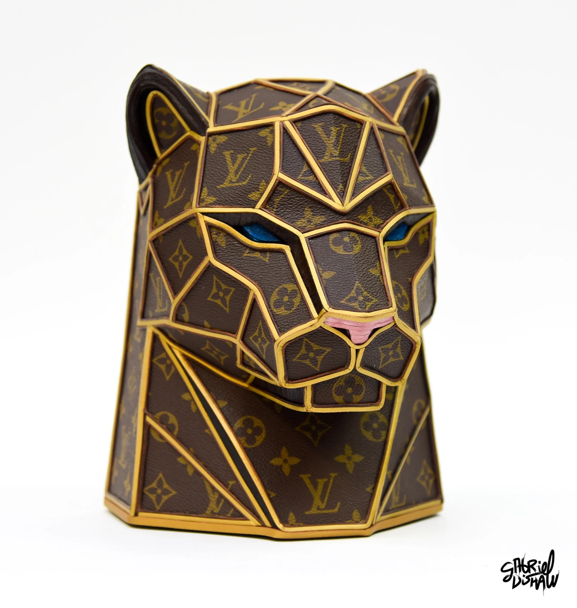 Panther Luxe, a geometric low-poly panther bust made from upcycled vintage Louis Vuitton monogram canvas with gold trim, leather seams, blue eyes, and a pink nose