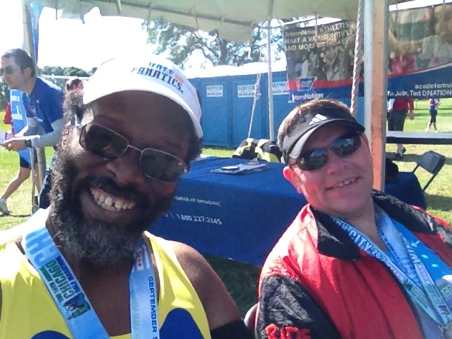 Mike Rice and I at the DIocese of Chicago tent after the race feeling happy we were done.