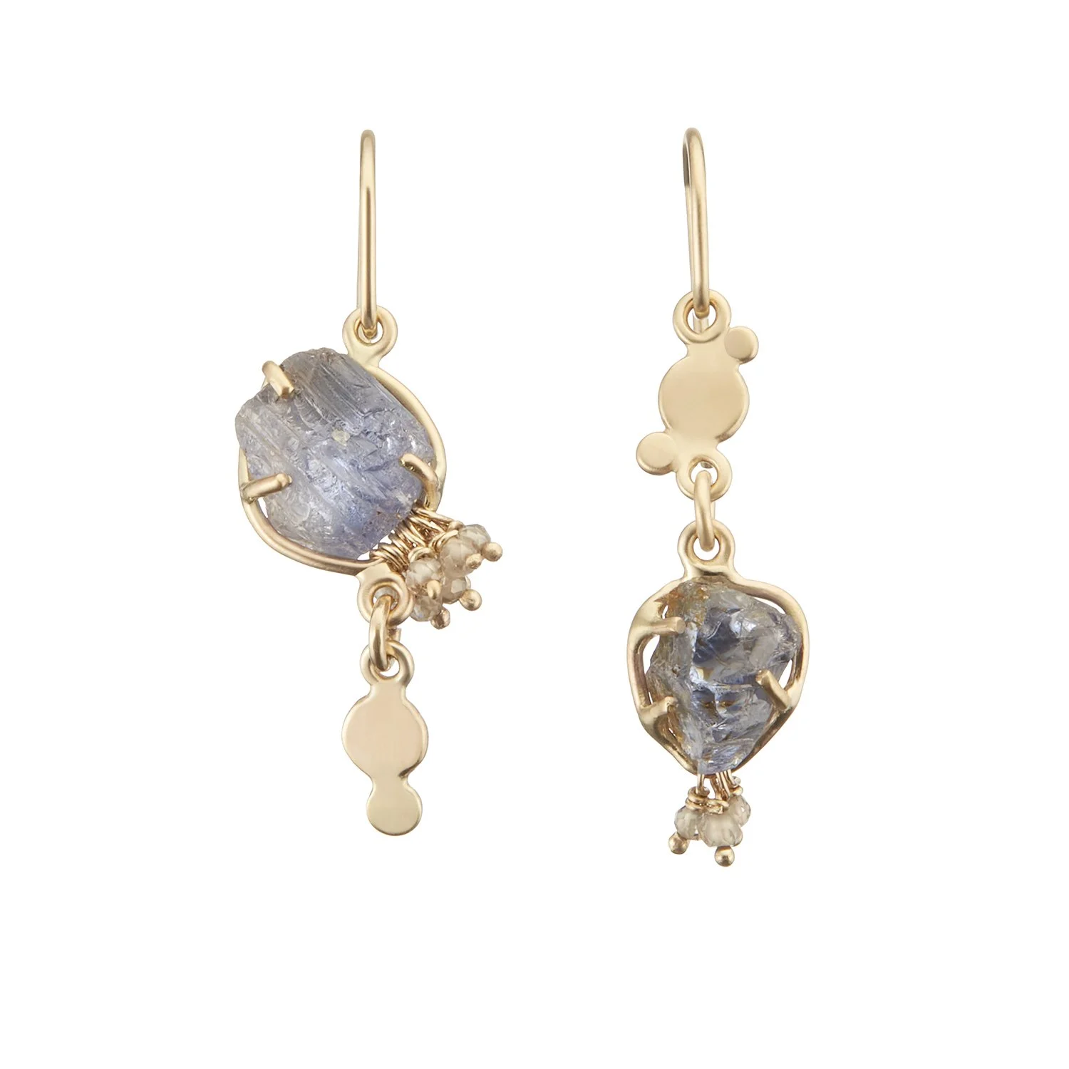 A pair of 14k gold and natural textured/unfaceted sapphire dangle earrings on a white background.