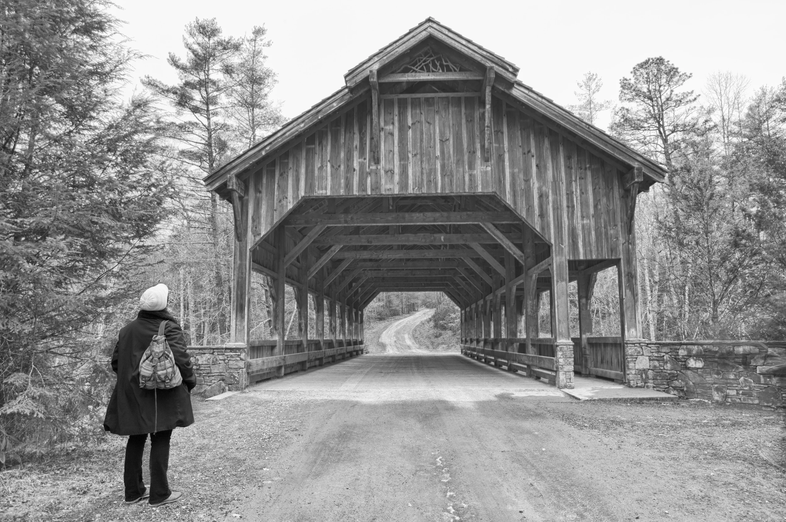 My wife looking at the covered bridge. Photographer: John Puett.