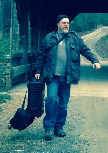 Lugging a camera. Photo by Rebecca Puett