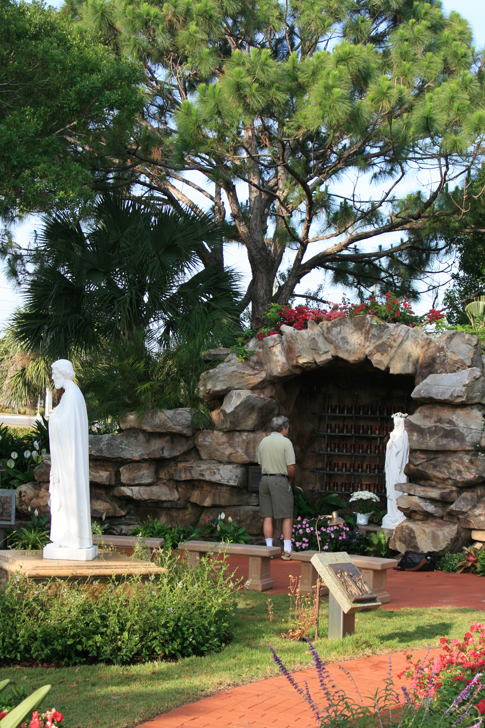 Meditation Garden at St. Peter Catholic Church Jupiter Entry to Grotto Pine Trees.jpg