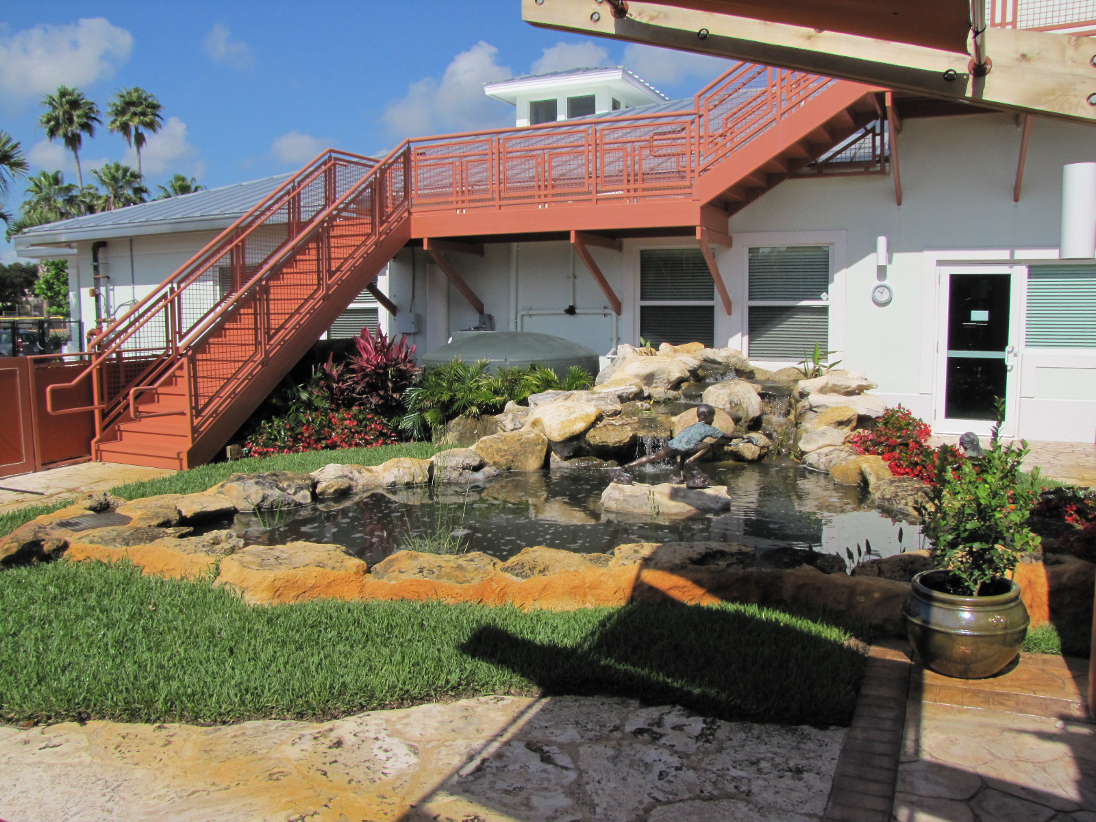 Turtle River Montessori Collected Rainwater Pond.jpg