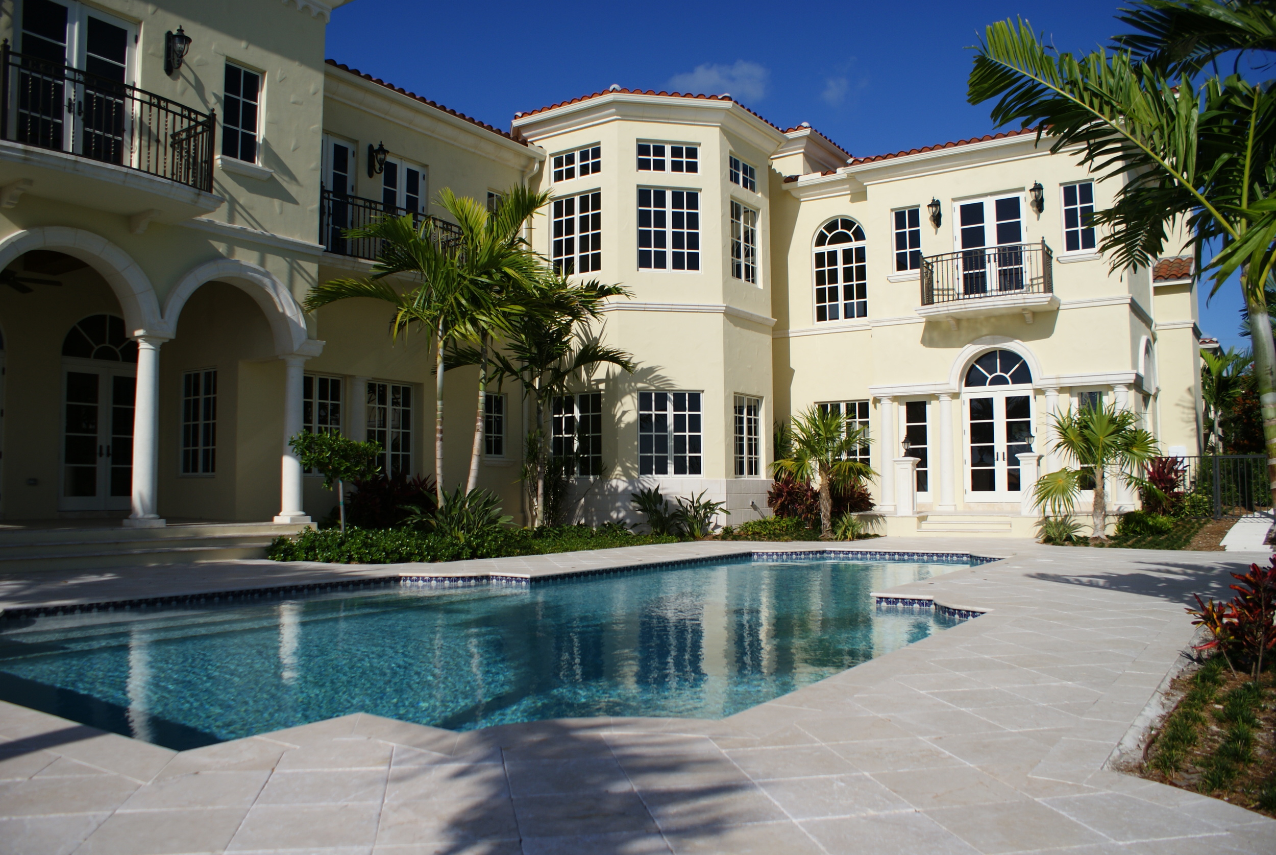 Jupiter Mediterranean Residence Travertine Pool Deck.JPG