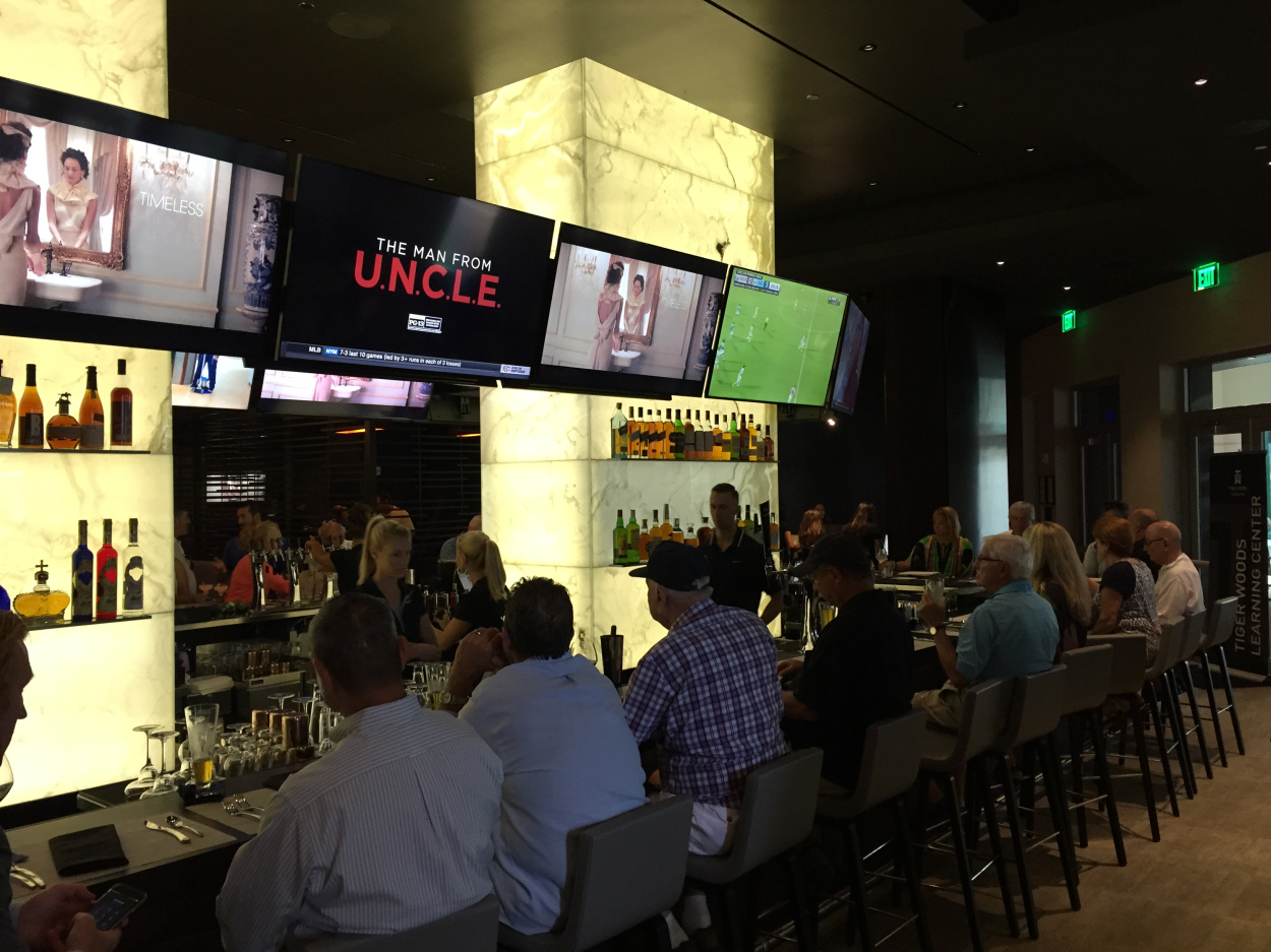 The Woods Jupiter, golfer Tiger Woods’ restaurant in Harbourside Place, opened Monday at 4 p.m. with a crowd quickly forming. (Carlos Frías/The Palm Beach Post)