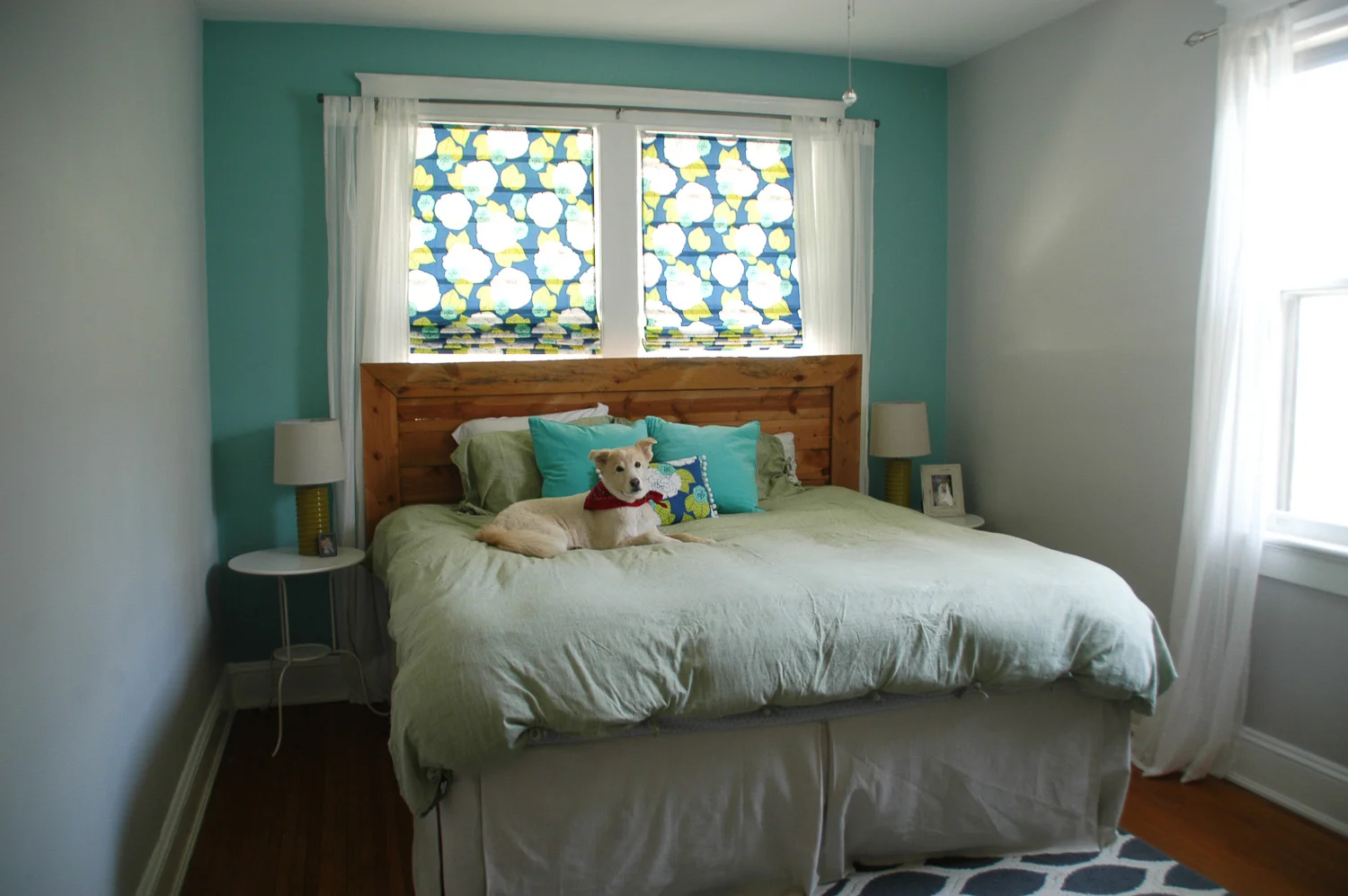 After spending hours upon hours searching for the perfect curtains, I finally had enough! I felt so constricted by the patterns and colors I kept coming across, and feeling like I had to comprise too much. So I decided to head to JoAnn, in search for the perfect fabric for these roman shades. A pair of mini blinds, a little sewing and a lot of glue later, and ta-da! 