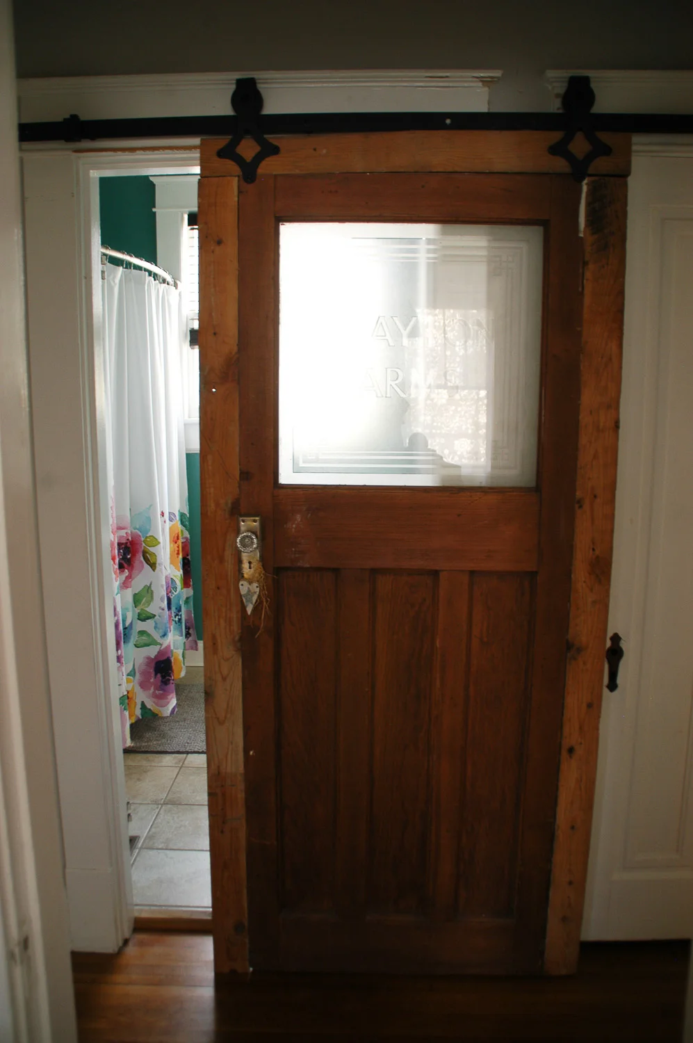 This door has such a great history! My grandma loved anything to do with history, especially antique furniture and rare treasures. Over the years she became great at spotting cool pieces and salvaging them to give them a new purpose. She found this office door in an old building that she was taking down, and decided it would be perfect for her bathroom. She passed away a little over 2 years ago, and this door serves as the perfect reminder of her and my grandpa both! 