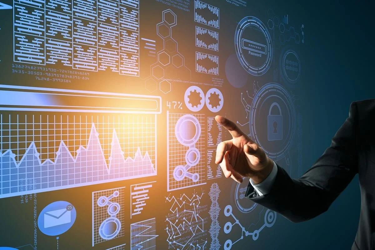 Business professional analyzing digital charts and system data to assess SAP HANA implementation readiness and requirements