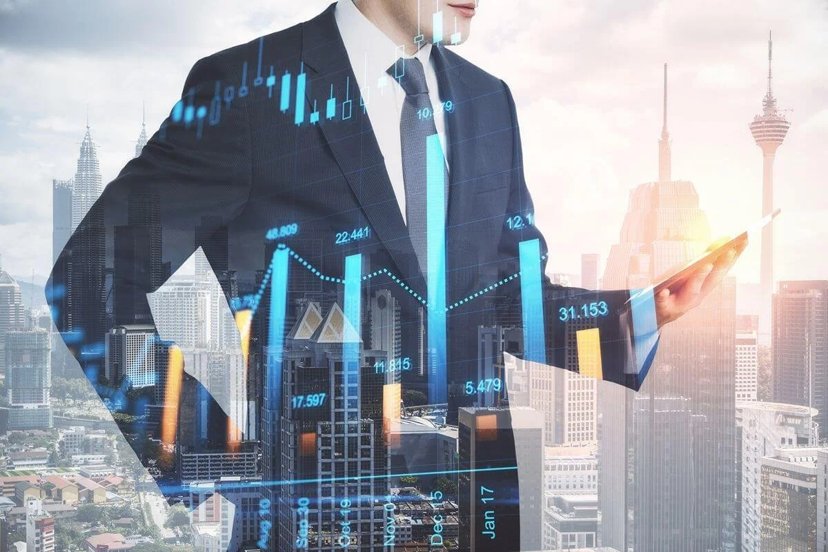 Business professional using a tablet with digital charts and city data representing technology integration services and business analytics