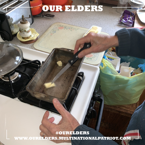 Buttered the sides of the baking pans over a hot stove.