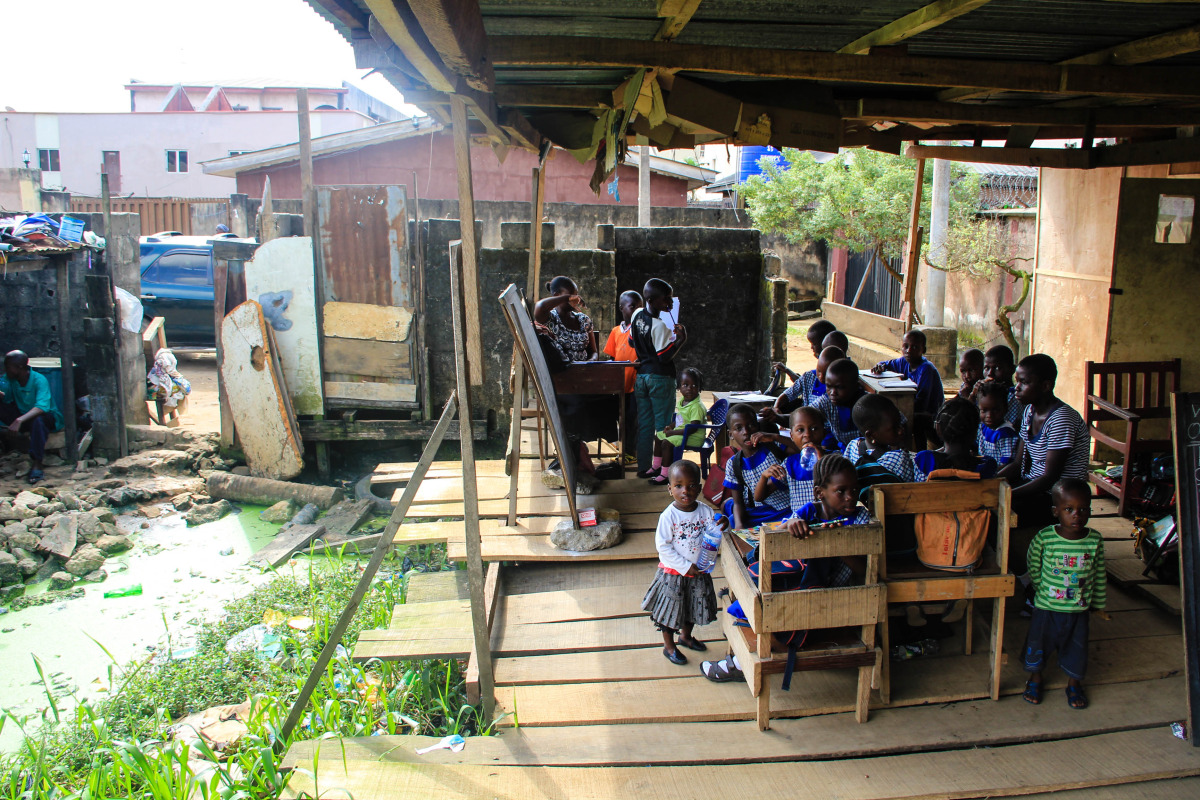 Ago Okota Community School, built on top of sewage. Despite the community’s many challenges, 100 of Ago Okota’s most vulnerable children receive an education here.