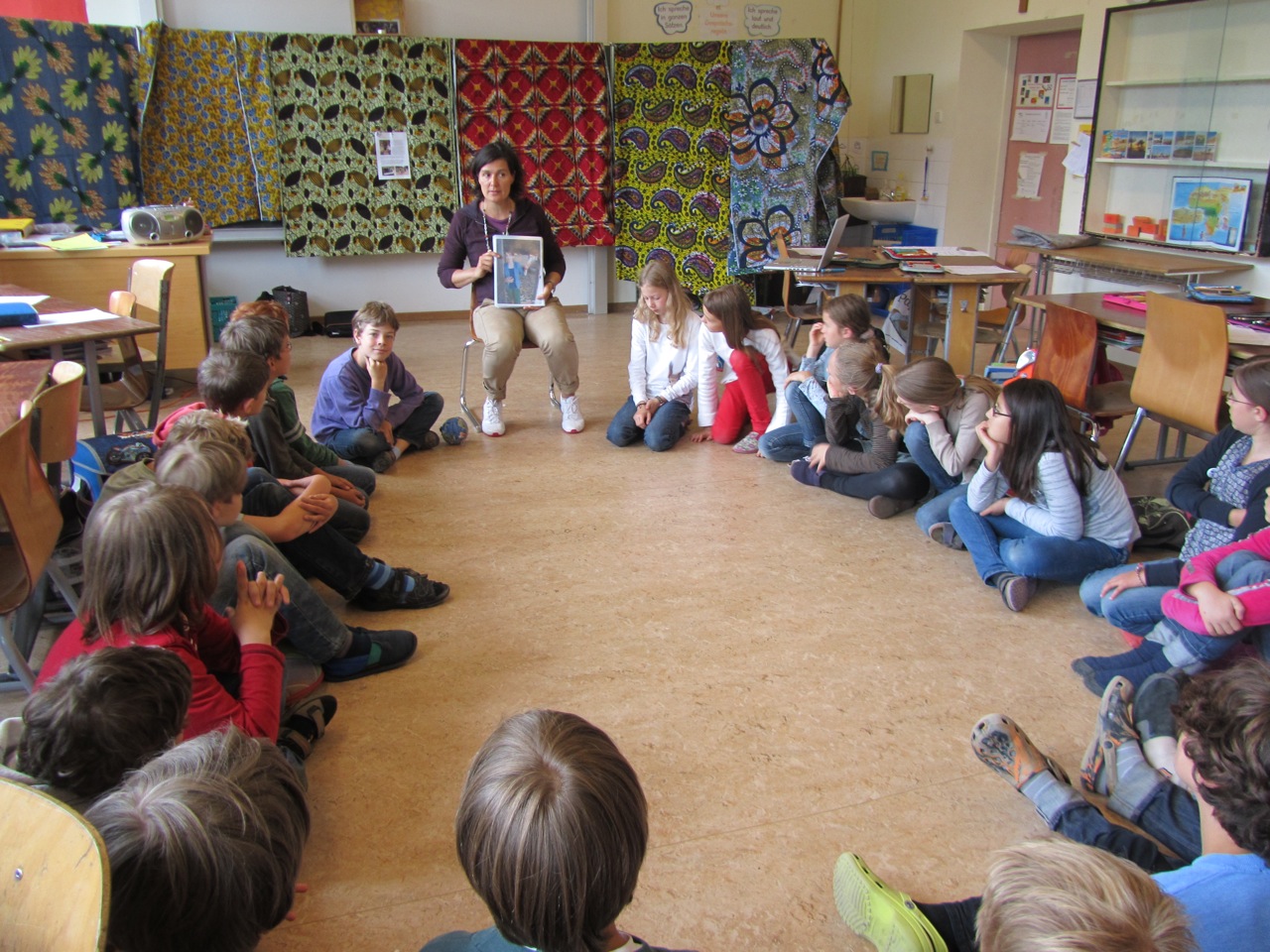 Julia speaking to school children about the life of an African child