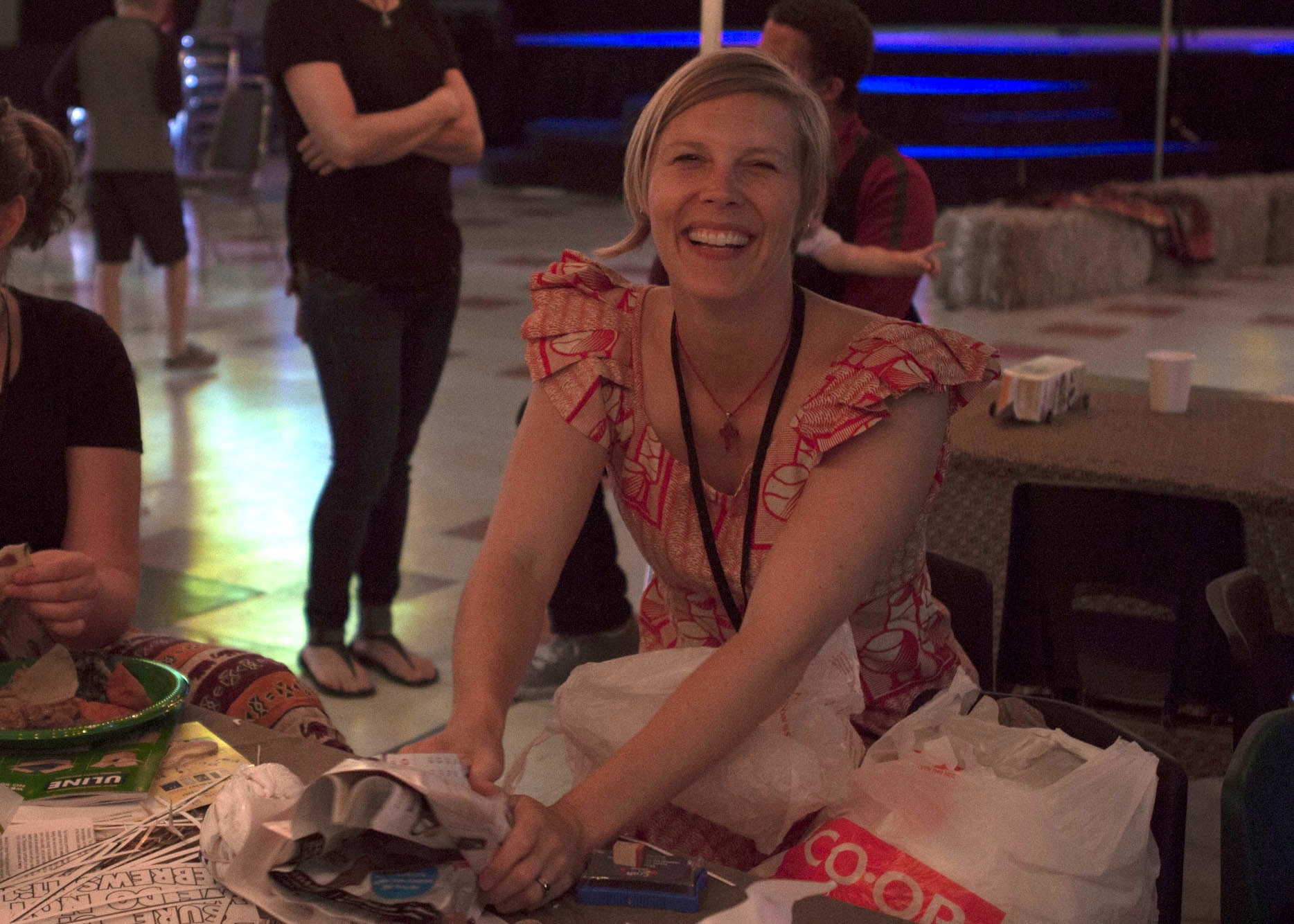  Bree Bone helping children build plastic bag soccer balls. 