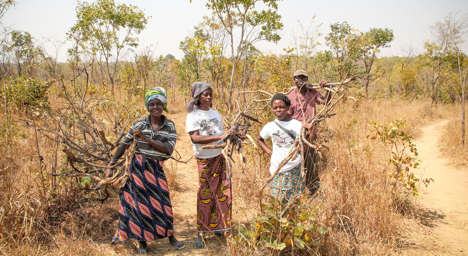 On a regular basis women from the community have to collect firewood in order to cook food for their families.