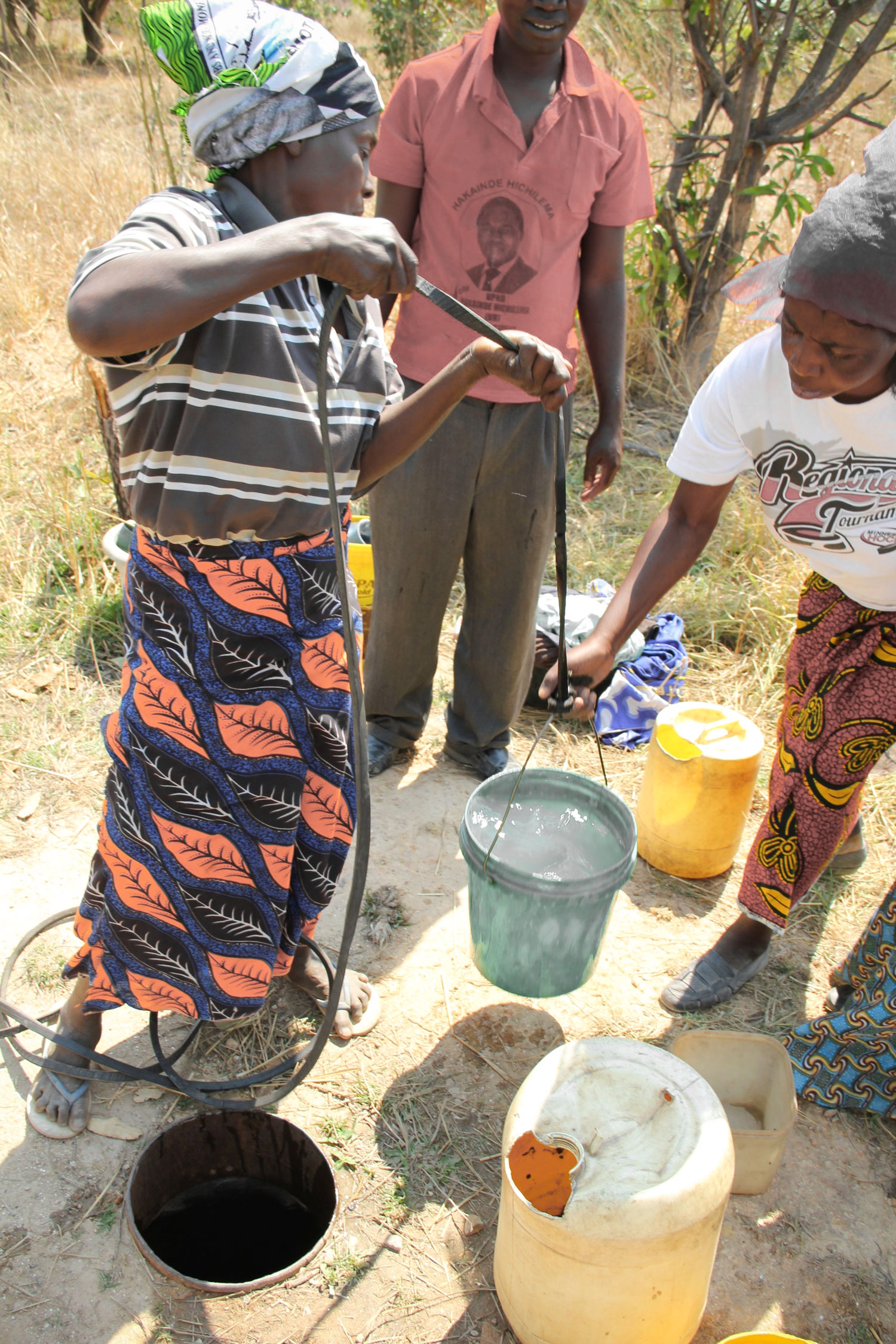  In order to cook for the children and have water for cleaning, the Care Workers have to collect water from the nearby well. 