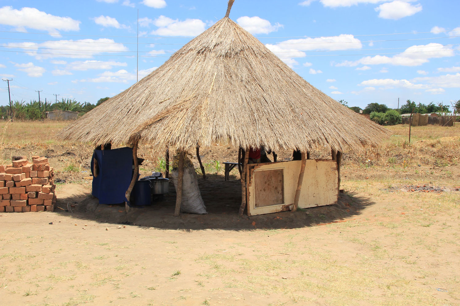This thatched hut is used for cooking and storage in Chisamba community.