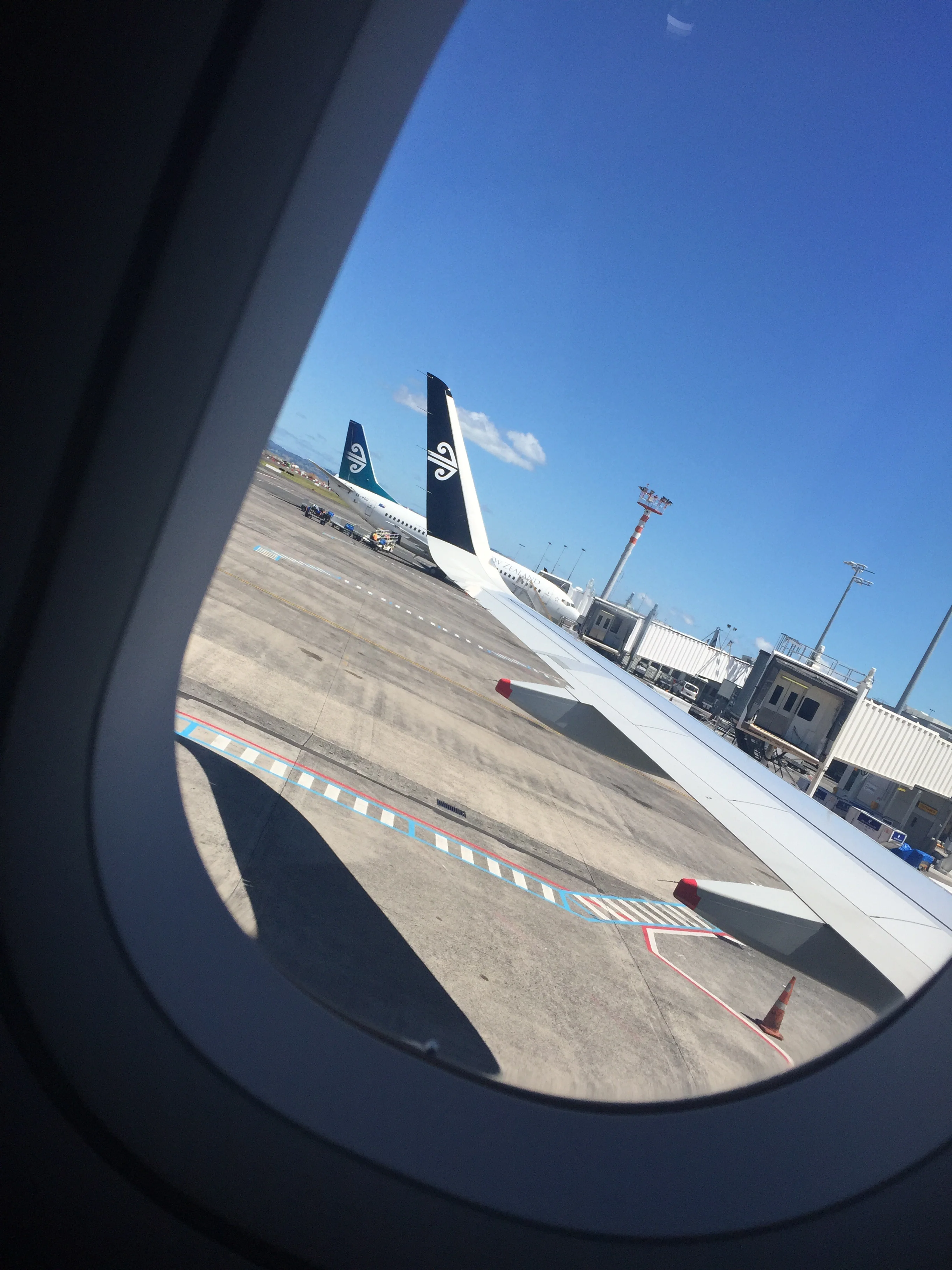 I love that on the plane we can keep our 'lightweight' mobile devices on so long as they're in flight mode - that means I can take photos out the window and not incur the potential growling.