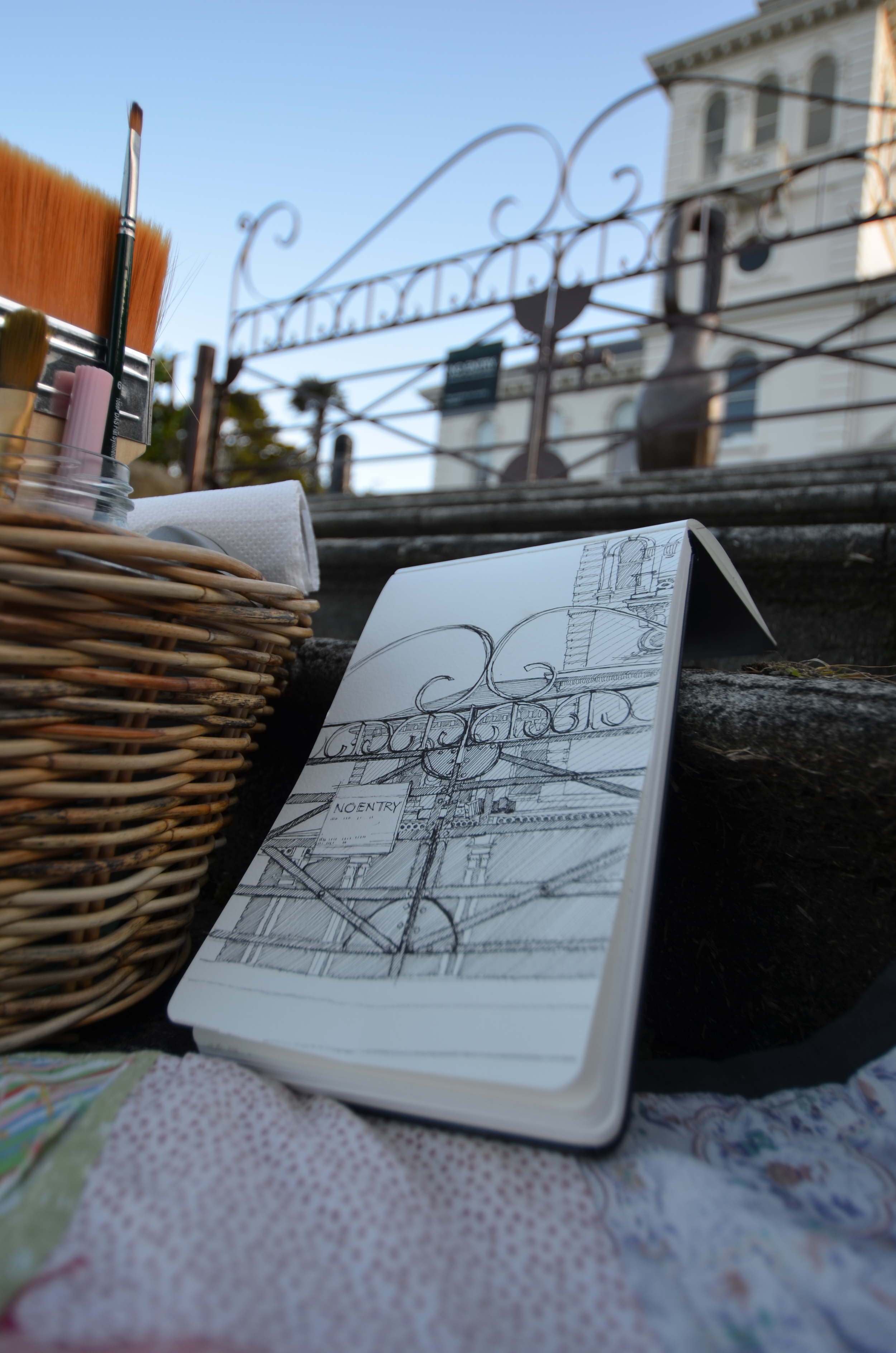 Drawing the gate with the pah homestead in the background