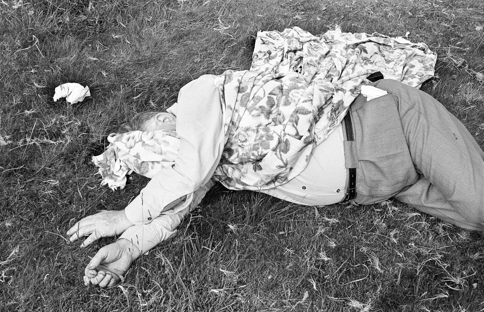 Uncle Les asleep in the sun - Les was my Auntie Rhoda’s husband. On Sundays in the summer they would often take me out in the car for a picnic. Les liked to drive to the nearby Brecon Beacons. There we would have sweet tea, ham sandwiches and cream cakes laid out on a cloth. Afterwards Les would invariably fall asleep in the sun. Rhoda would worry about him being burnt and would attempt to cover him with the cloth. It was a miracle she never suffocated him. I always remember an occasion at their home when she once woke him up because he hadn’t taken his sleeping tablet.