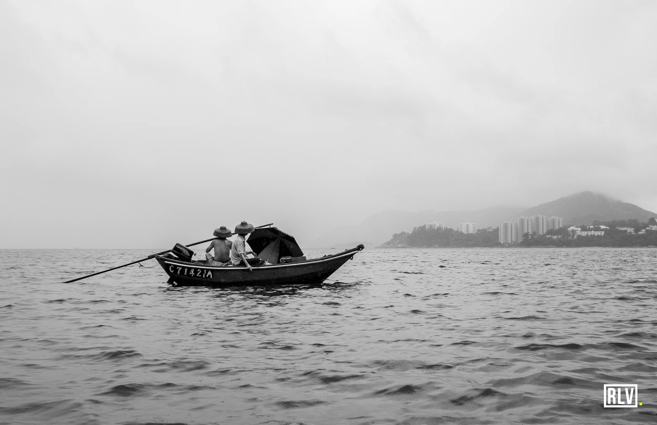 One of my favourite photos from the water. Local fishermen battling the wet and wild conditions off from Stanley beach